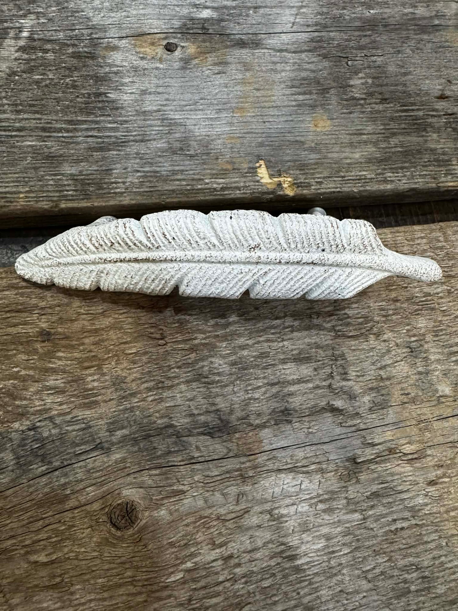 FEATHER HANDLE